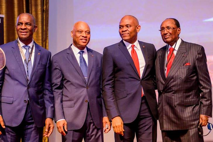 L-R: Chairman of the National Council of Employers, General Confederation of Enterprises of Côte d'Ivoire (CGECI), Jean Kacou Diagou; Minister of industry & Mines Côte d’Ivoire, Jean Claude Brou; Chairman, Heirs Holdings, United Bank for Africa Plc and keynote speaker /recipient of the CGECI Lifetime Achievement Tony O. Elumelu; and Chairman of Centum Group, Christopher John Kirubi, at the 5th edition of the annual forum of the CGECI Academy 2016 held in Abidjan, Côte d’Ivoire