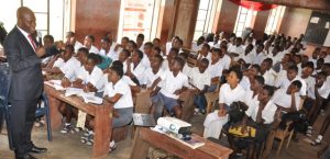 Executive Director, Lagos and West Bank, United Bank for Africa, Mr. Liadi Ayoku teaching at the Olivet Baptist High School , Oyo, during the  financial literacy training programme for students, an  initiative of Central Bank of Nigeria, in commemoration of World Savings Day on Monday in Oyo, Oyo State  