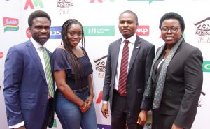 L-R: Group Head, Corporate Communications of the Heritage Bank Plc, Fela Ibidapo; BB Naija 1st runner up, Bisola Ayeola; Team member, Media & External Relation Officer, Blaise Udunze and Team member, Brand Compliance & Management, Ozena Utulu, during the Big Brother Naija Season-2 reality TV show grand prize presentation on Tuesday, in Lagos.  