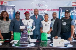 l-r: Business Development Manager, VFD Microfinance Bank, Adaobi Ekweanya; National Coordinator, Federal Engagement and Enlightenment Tax Teams, Federal Inland Revenue Services(FIRS), Alhaji Kunle Oseni; Overall Winner, Nigeria Freestyle Football  Championship, Mr McCarthy Obanor; Chairman of Feet ‘n’ Tricks Limited, Valentine Ozigbo ; Winner, Women Category,  Nigeria Freestyle Football  Championship, Miss Rasheedat Babajide;  Senior Sales Manager, CIG Motors Limited, distributor of GAC brands of vehicles in Nigeria, Mr. Phillip Eboka;; and CEO, Feet ‘n’ Tricks Limited, Mr O’Dyke Nzewi, at the presentation ceremony of  GAC Saloon Car and other prizes to winners of the Nigeria Freestyle Football  Championship organised by Feet ‘n’ Tricks Limited , in Lagos on Monday