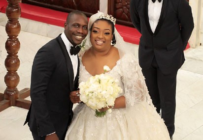 Olujonwo Obasanjo and Temitope Kessington Adebutu during their wedding